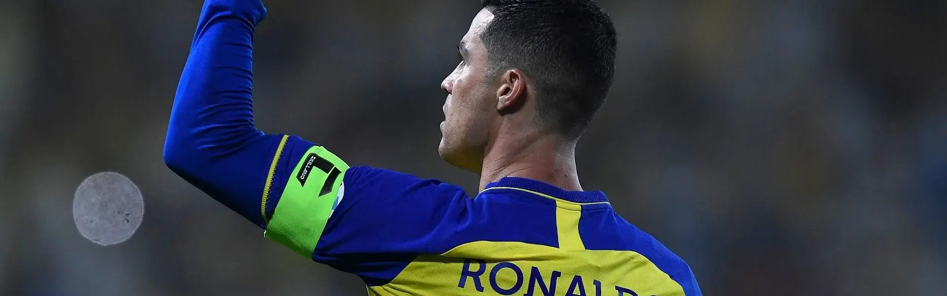 Cristiano Ronaldo disappointed after Al-Nassr’s shocking exit from the tournament, standing on the field with a tense expression.